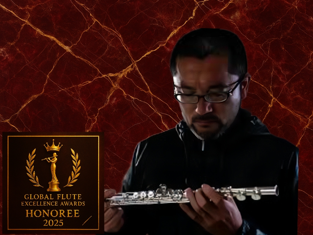 Shuhou Sakurai examining a handcrafted Sakurai flute – Flute Maker of the Year 2025